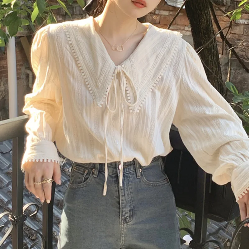 French Niche Chic Top Early Autumn Shirt Women's New 2021 Korean Versatile Sweet Doll Collar Long Sleeved Cardigan
French Niche Chic Top Early Autumn Shirt Women's New 2021 Korean Versatile Sweet Doll Collar Long Sleeved Cardigan