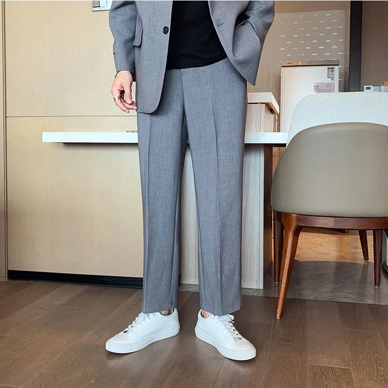 Брюки мужские костюмные до щиколотки, модные повседневные шикарные штаны в Корейском стиле, уличная одежда с эластичным поясом 
Брюки мужские костюмные до щиколотки, модные повседневные шикарные штаны в Корейском стиле, уличная одежда с эластичным поясом