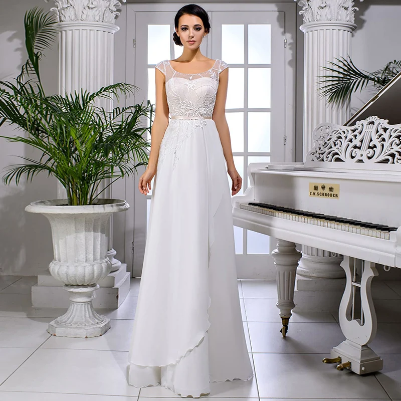 Elegant Beach Wedding Dress 2021 Chiffon Scoop Neck Cap Sleeve Appliques Backless Bridal Gowns Vestido de Novia
Elegant Beach Wedding Dress 2021 Chiffon Scoop Neck Cap Sleeve Appliques Backless Bridal Gowns Vestido de Novia