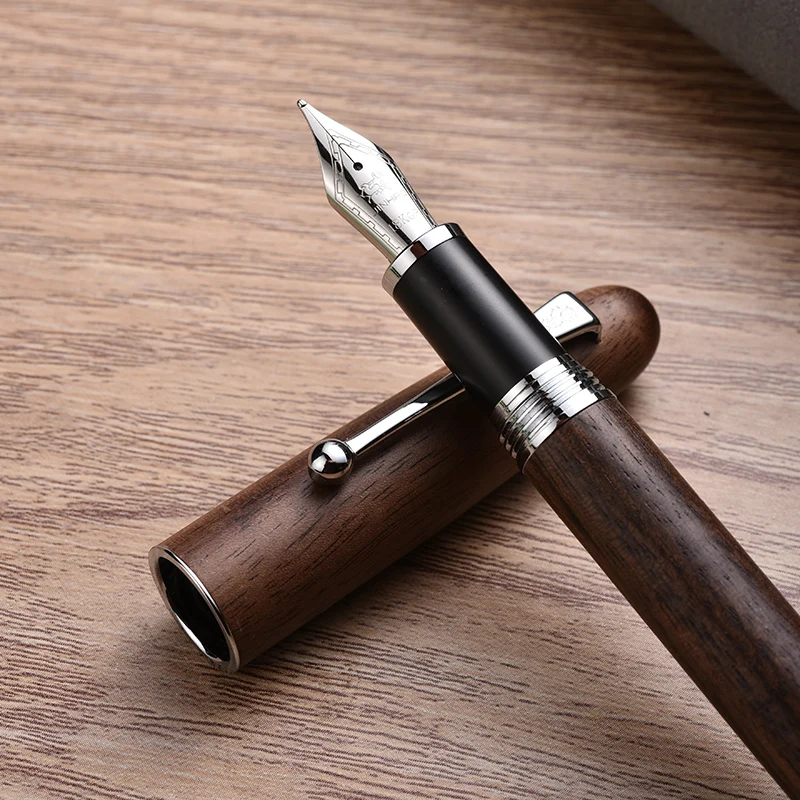 Jinhao Nieuwe Houten Vulpen Hoge Kwaliteit 0.7Mm Penpunt 2 Kleuren Luxe Hout Inkt Pennen Relatiegeschenken Schrijven Office
Jinhao Nieuwe Houten Vulpen Hoge Kwaliteit 0.7Mm Penpunt 2 Kleuren Luxe Hout Inkt Pennen Relatiegeschenken Schrijven Office