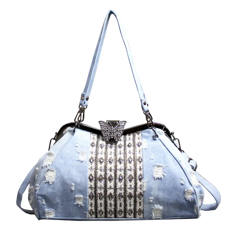 the new female bag light blue denim personality one shoulder bag butterfly clip set auger worn high-capacity package
the new female bag light blue denim personality one shoulder bag butterfly clip set auger worn high-capacity package