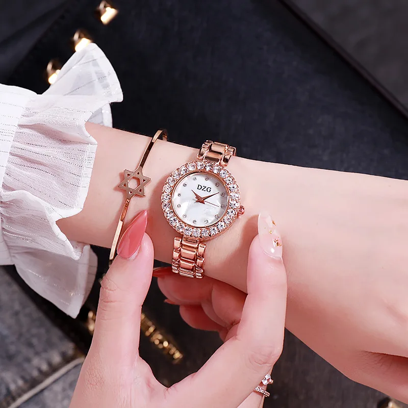 New DZG Rhinestone Edged Round Watch Noble Atmosphere Simple Temperament Ladies Watch
New DZG Rhinestone Edged Round Watch Noble Atmosphere Simple Temperament Ladies Watch