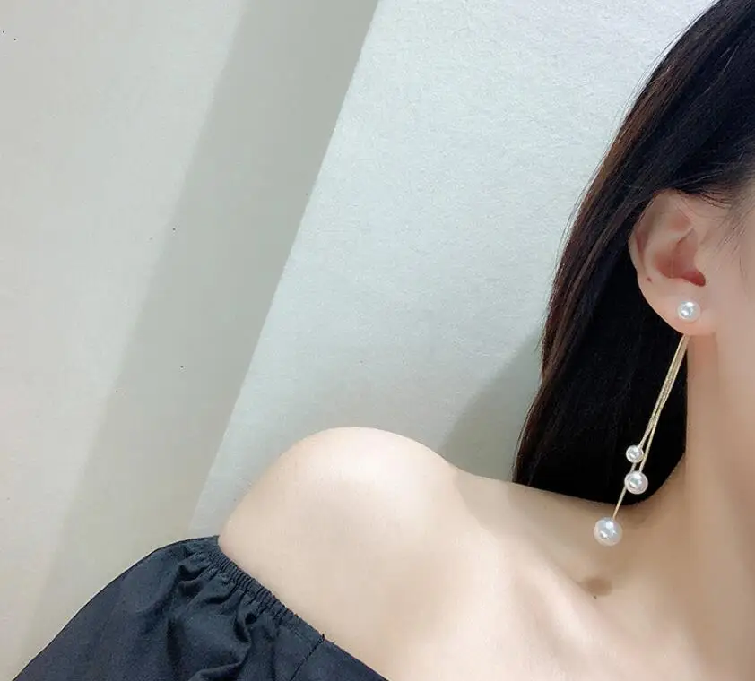 Temperament Long Pearl Tassel Metal Earrings Personality Round Beads Female Fashion Earrings Simple And Elegant Jewelry 
Temperament Long Pearl Tassel Metal Earrings Personality Round Beads Female Fashion Earrings Simple And Elegant Jewelry