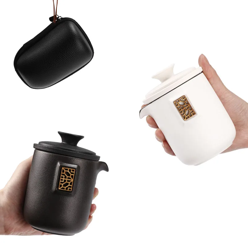 Kung Fu Travel Tea Set Ceramic Set A pot of two or four cups of outdoor tea on board separates the Express Cup
Kung Fu Travel Tea Set Ceramic Set A pot of two or four cups of outdoor tea on board separates the Express Cup