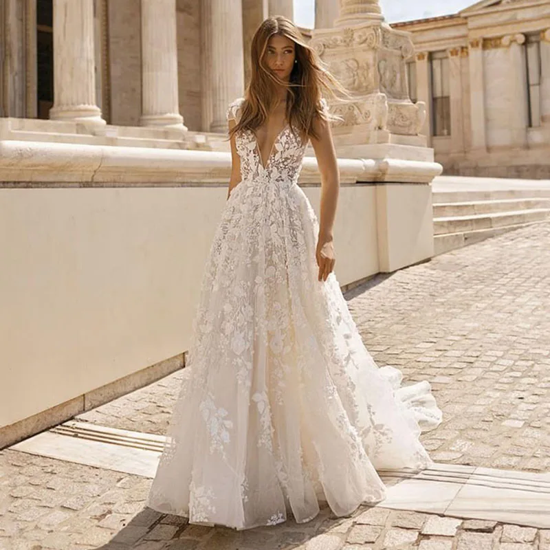 Beach Wedding Dress 3D Floral Applique Lace V Neck Sleeveless Backless Boho Wedding Gowns Plus Size Bridal Dress
Beach Wedding Dress 3D Floral Applique Lace V Neck Sleeveless Backless Boho Wedding Gowns Plus Size Bridal Dress