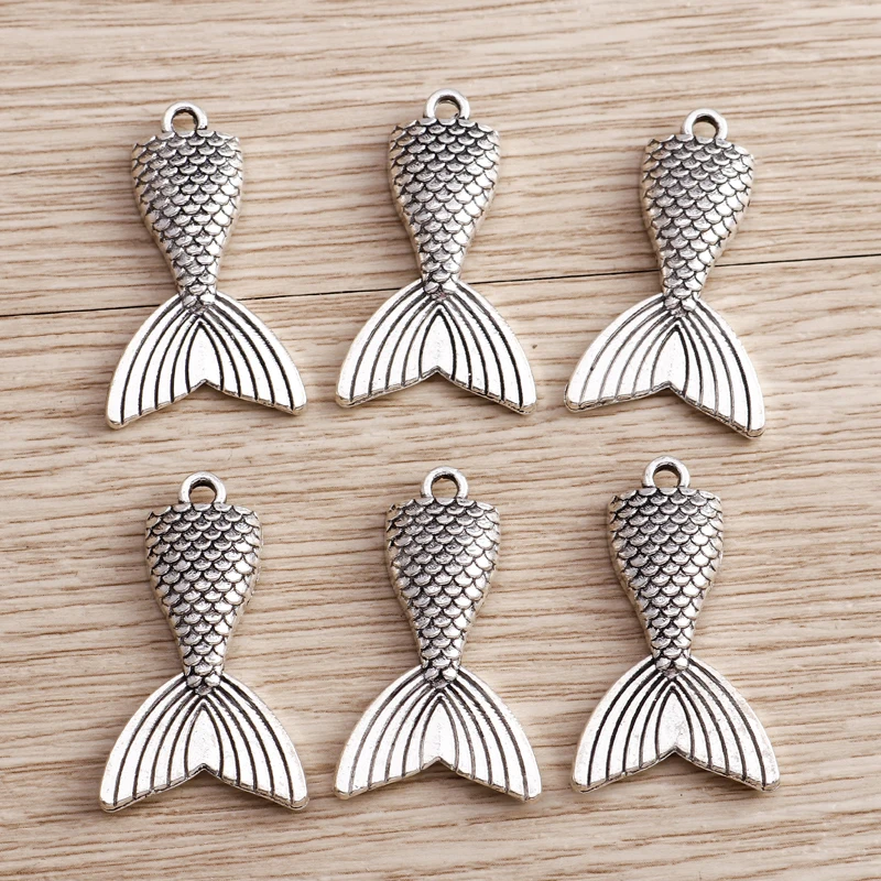 10pcs 19*31mm Metal Whale Tail Fish Charms for Jewelry Pendants Making DIY Tibetan Silver Color Mermai Charms Necklaces Earrings
10pcs 19*31mm Metal Whale Tail Fish Charms for Jewelry Pendants Making DIY Tibetan Silver Color Mermai Charms Necklaces Earrings