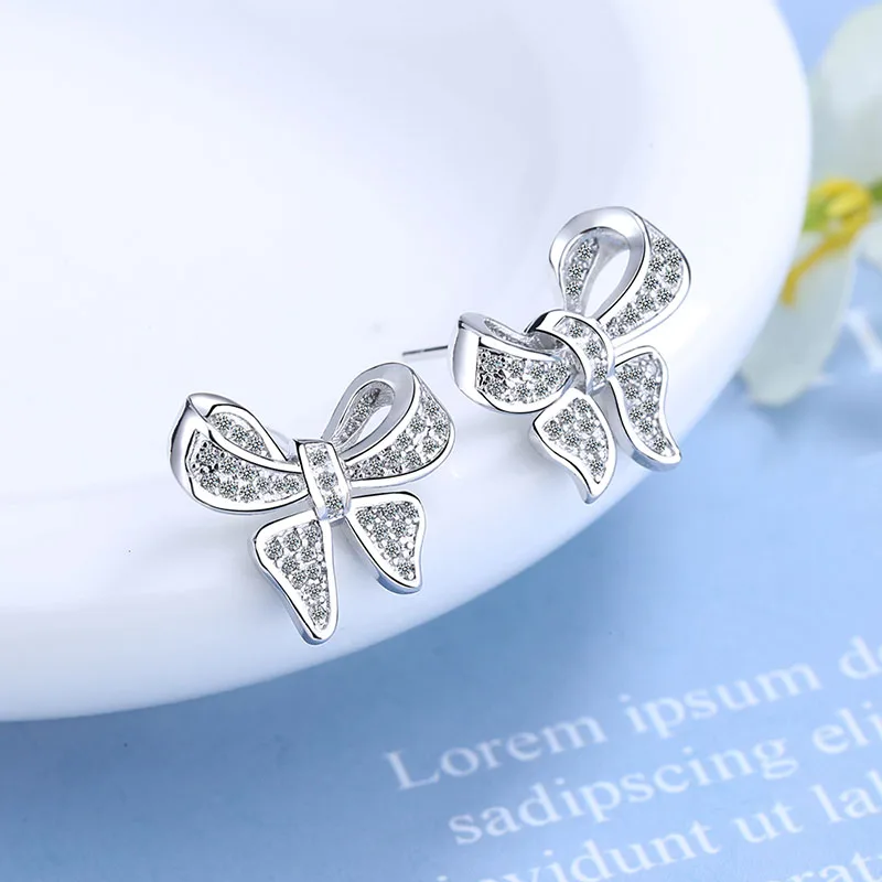 Classic Bowknot Stud Earring Fashion Elegant Silver Color 5A Zircon Earrings for Women Female Jewelry Gift Boucle Oreille Femme
Classic Bowknot Stud Earring Fashion Elegant Silver Color 5A Zircon Earrings for Women Female Jewelry Gift Boucle Oreille Femme