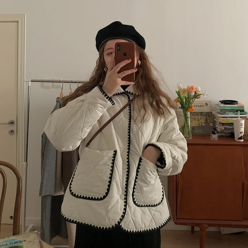 Net red 2021 autumn design sense of minority down cotton padded jacket women's winter Korean version light Ling grid short
Net red 2021 autumn design sense of minority down cotton padded jacket women's winter Korean version light Ling grid short