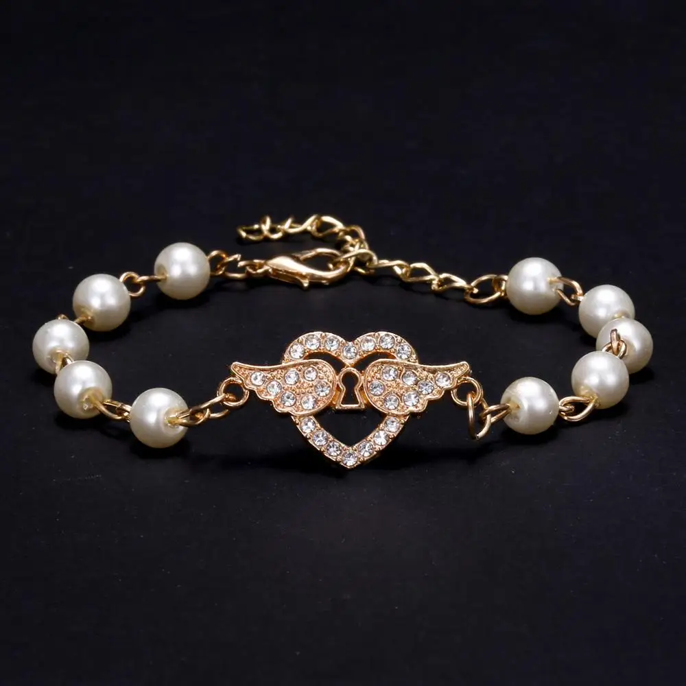 Women Gold Chain Pearl Bracelets Love Cross Moon Star Starfish Butterfly Hollow Pendant Rhinestone Pearl Beads Bracelet Jewelry 
Women Gold Chain Pearl Bracelets Love Cross Moon Star Starfish Butterfly Hollow Pendant Rhinestone Pearl Beads Bracelet Jewelry