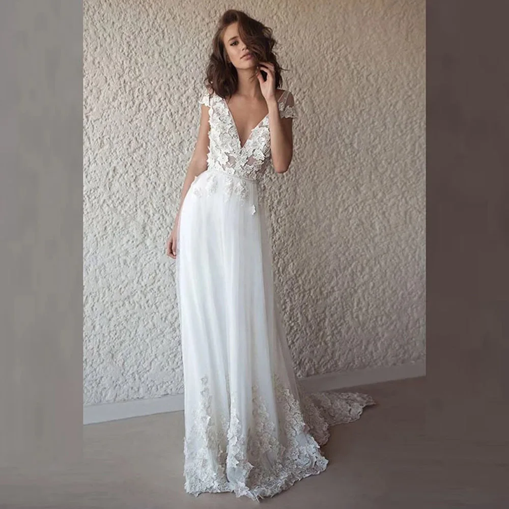 Shwaepepty Sexy Backless Bohemian Wedding Dresses White Cap Sleeve Floral Lace Appliques Long Boho Beach Bride Wedding Gowns
Shwaepepty Sexy Backless Bohemian Wedding Dresses White Cap Sleeve Floral Lace Appliques Long Boho Beach Bride Wedding Gowns