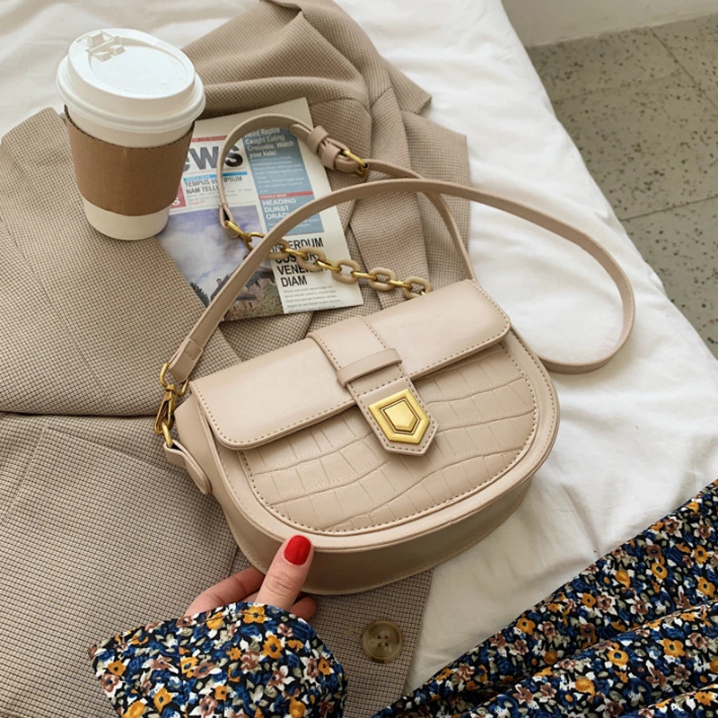 2021 Spring New Solid Color Flip Saddle Bag High-quality PU Leather Women's Designer Handbag Lock Shoulder Messenger Bag Purses
2021 Spring New Solid Color Flip Saddle Bag High-quality PU Leather Women's Designer Handbag Lock Shoulder Messenger Bag Purses
