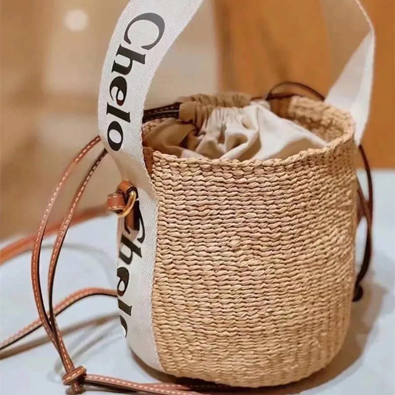 New Popular Straw Woven Bucket Bag for Women Ribbon Letter Printed Ladies One-shoulder Small Bags Designer Purses and Handbags
New Popular Straw Woven Bucket Bag for Women Ribbon Letter Printed Ladies One-shoulder Small Bags Designer Purses and Handbags