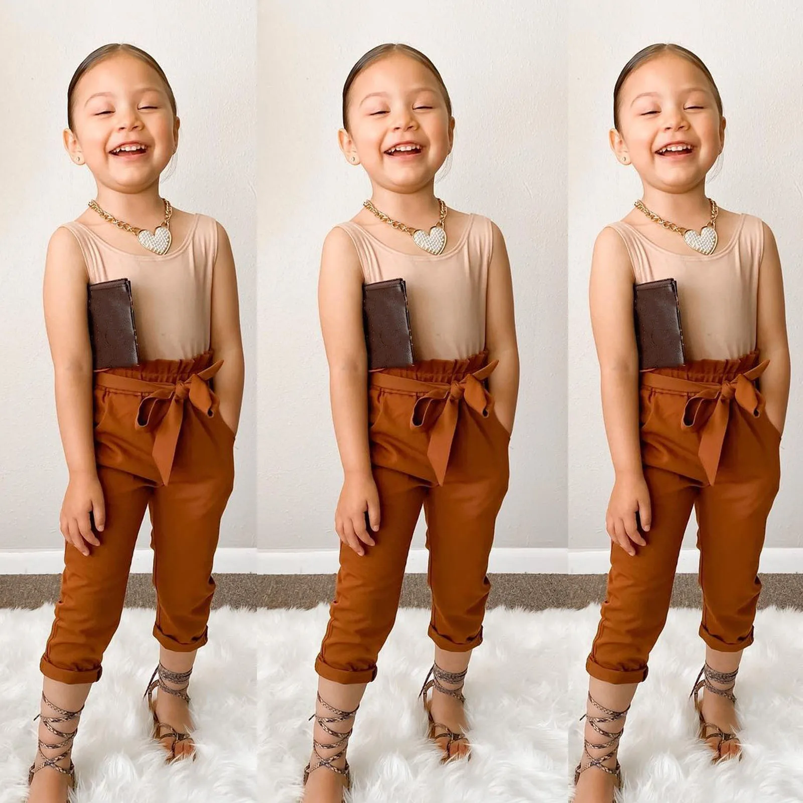 2Pcs Little Girls Outfit, Toddlers Summer Solid Color Sleeveless Round Collar Vest + Brown Ninth Pants with Belt
2Pcs Little Girls Outfit, Toddlers Summer Solid Color Sleeveless Round Collar Vest + Brown Ninth Pants with Belt