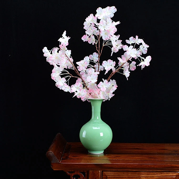 Jingdezhen ceramic vase handmade bean celadon porcelain auspicious porcelain ornaments Chinese home decorations flower vase
Jingdezhen ceramic vase handmade bean celadon porcelain auspicious porcelain ornaments Chinese home decorations flower vase