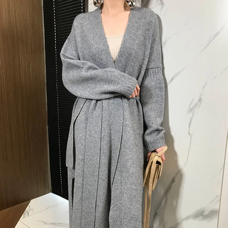 2021 autumn and winter new cashmere cardigan women loose wild long paragraph over the knee ladies sweater coat sweater
2021 autumn and winter new cashmere cardigan women loose wild long paragraph over the knee ladies sweater coat sweater