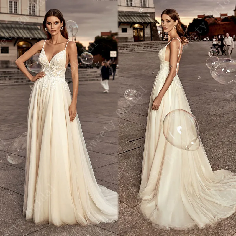 Beach Wedding Dresses 2021 Deep V Neck Sleeveless Boho A line Vestido De Noiva Spaghetti Straps Beach Bridal Gowns Open Back
Beach Wedding Dresses 2021 Deep V Neck Sleeveless Boho A line Vestido De Noiva Spaghetti Straps Beach Bridal Gowns Open Back