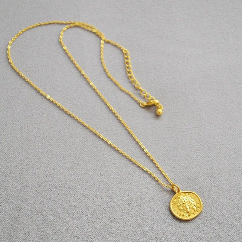French style simple retro brass carving handsome Prince Charming gold irregular round tag pendant necklace woman 
French style simple retro brass carving handsome Prince Charming gold irregular round tag pendant necklace woman