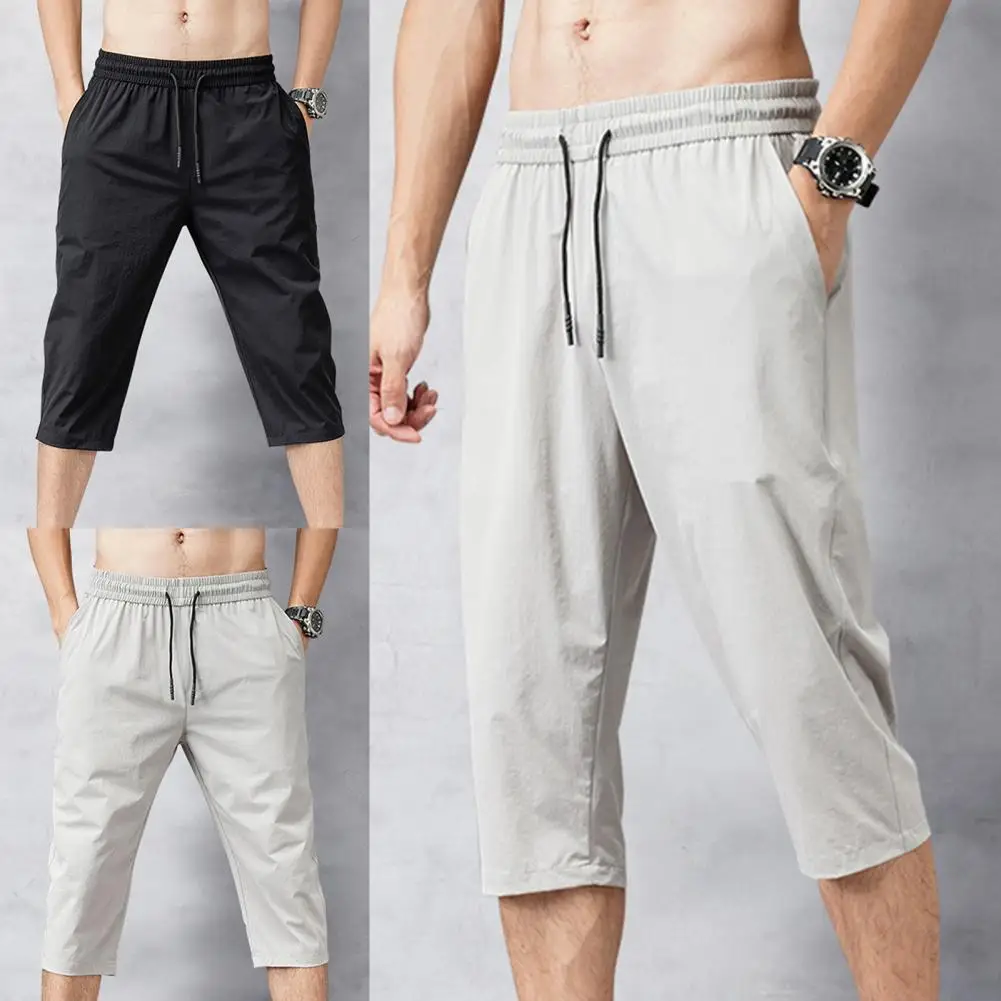 Solid Color Capri Pants Elastic Waist Men Drawstring 3/4 Length Cropped Trousers Sweatpants 
Solid Color Capri Pants Elastic Waist Men Drawstring 3/4 Length Cropped Trousers Sweatpants