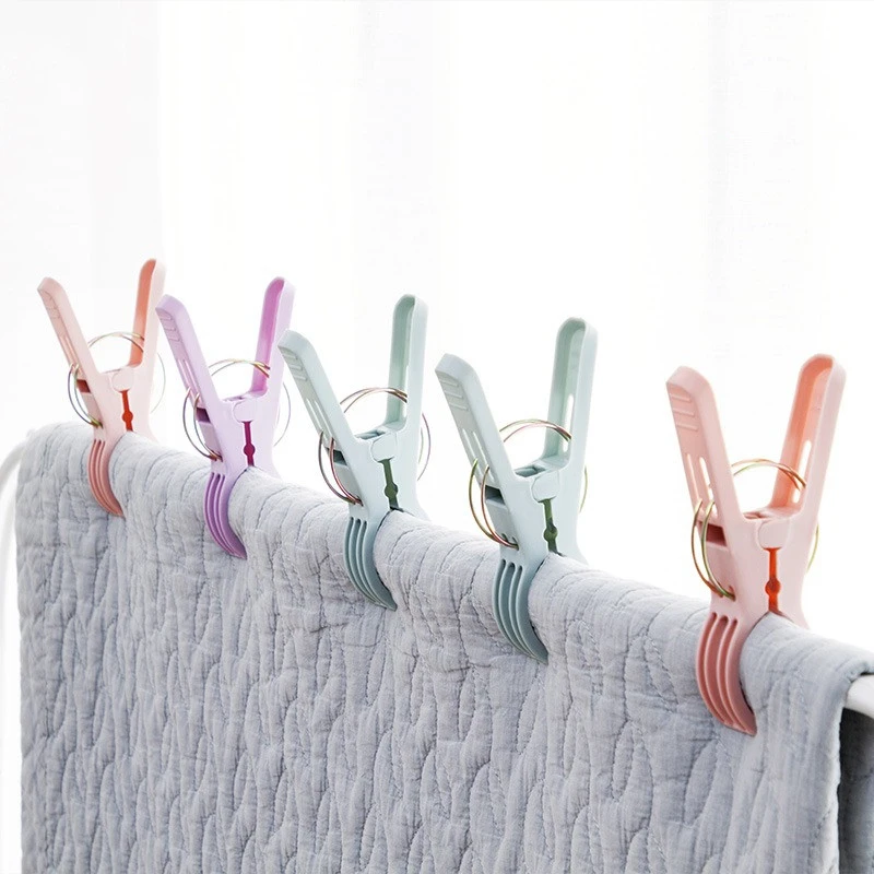 Household large clothes clip drying quilt clip drying clip plastic small clip drying rack windproof holder drying clip
Household large clothes clip drying quilt clip drying clip plastic small clip drying rack windproof holder drying clip