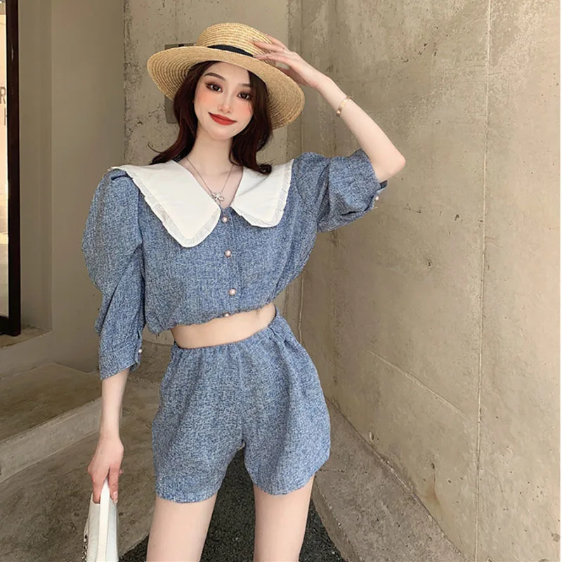 Korean Style Women Short Puff Sleeve Sweet Peter Pan Collar Shirt Blouse + Shorts Summer Vintage Two piece sets
Korean Style Women Short Puff Sleeve Sweet Peter Pan Collar Shirt Blouse + Shorts Summer Vintage Two piece sets