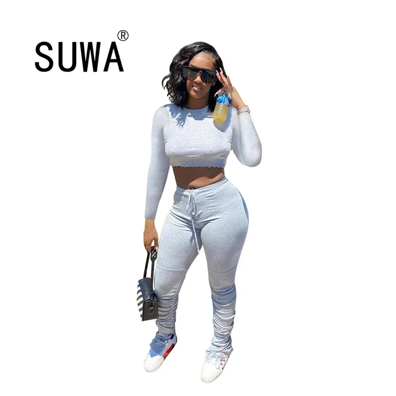 Hot Sport Solid Matching Sets Women Club Party Two Piece Outfits Long Sleeve Short Tee Top And Stacked Slit Flare Pants Suit
Hot Sport Solid Matching Sets Women Club Party Two Piece Outfits Long Sleeve Short Tee Top And Stacked Slit Flare Pants Suit