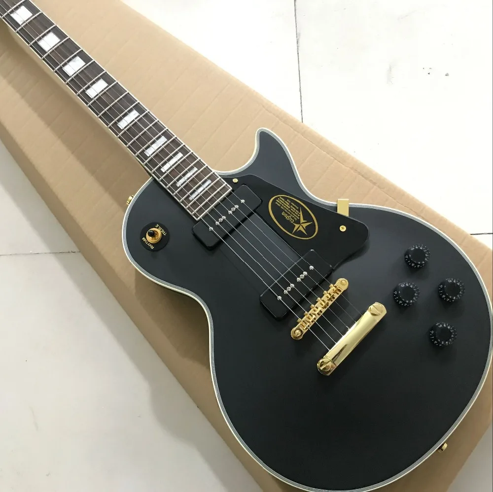 Custom black color electric guitar.high quality p90 pickups gitaar.ebony fingerboard guitarra.musical instruments.
Custom black color electric guitar.high quality p90 pickups gitaar.ebony fingerboard guitarra.musical instruments.