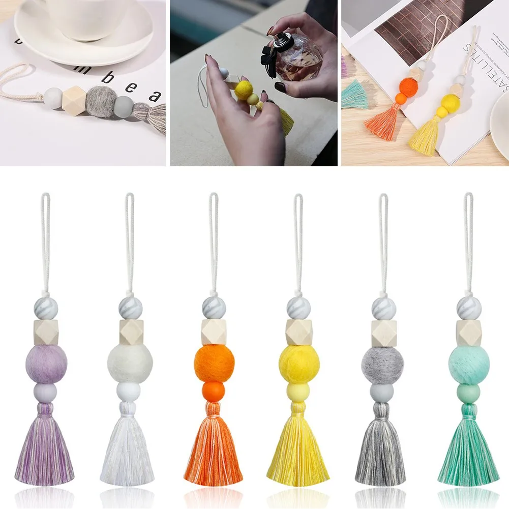 Natural Wood Felt Beads With Tassels Car Rearview Mirro Pendant Perfume Diffuser Interior Accessories Ornaments
Natural Wood Felt Beads With Tassels Car Rearview Mirro Pendant Perfume Diffuser Interior Accessories Ornaments