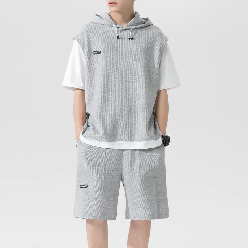 Suit men's 2021 summer new short sleeve hooded t-shirt men's two-piece suit splicing fake two-piece casual suit men's wear
Suit men's 2021 summer new short sleeve hooded t-shirt men's two-piece suit splicing fake two-piece casual suit men's wear