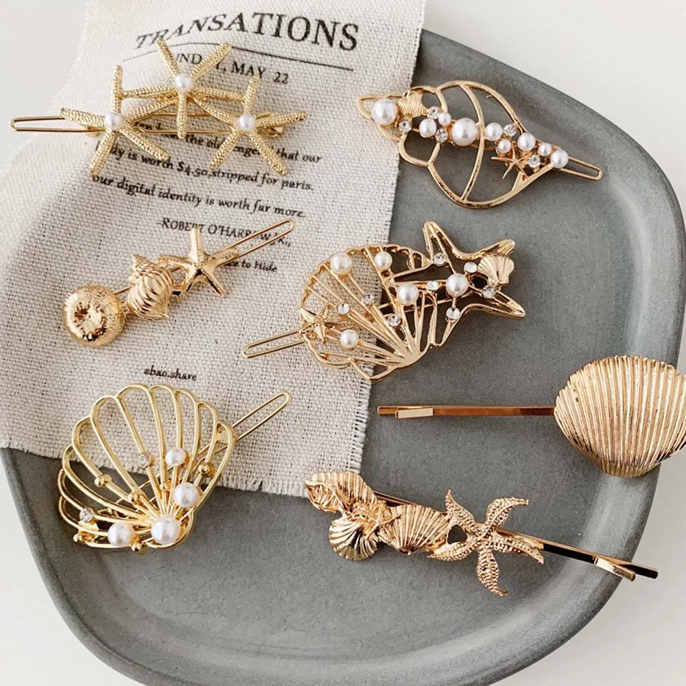 1Pcs Golden Metal Shell Hollow Starfish Conch Pearl Hair Grip Hairpin Hair Ornament Hair Accessories For Women Beach Vacation
1Pcs Golden Metal Shell Hollow Starfish Conch Pearl Hair Grip Hairpin Hair Ornament Hair Accessories For Women Beach Vacation