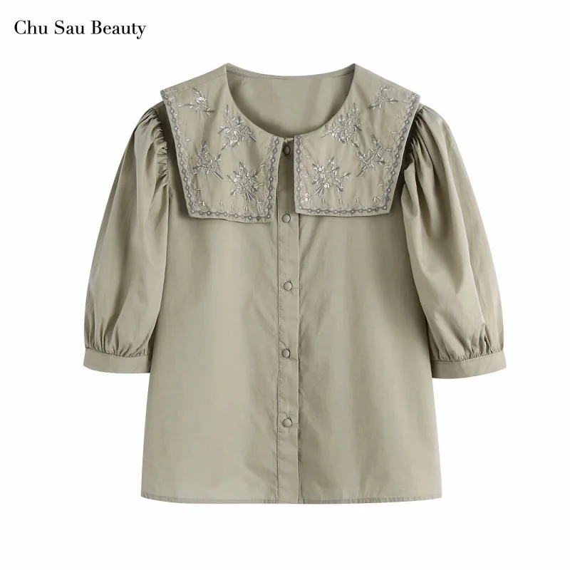 Chu Sau Beauty 2021 новый стиль кукольный воротник Ретро пышные рукава поплин рубашка вышитый Свободный Топ с коротким рукавом
Chu Sau Beauty 2021 новый стиль кукольный воротник Ретро пышные рукава поплин рубашка вышитый Свободный Топ с коротким рукавом