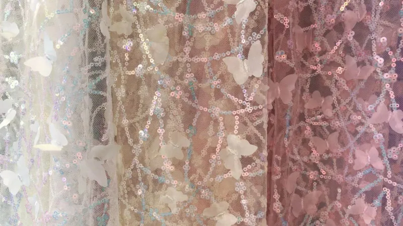 5 yards/Pack New mesh 3D butterfly sequin lace fabric DIY wedding dress children's dress dress accessories 
5 yards/Pack New mesh 3D butterfly sequin lace fabric DIY wedding dress children's dress dress accessories