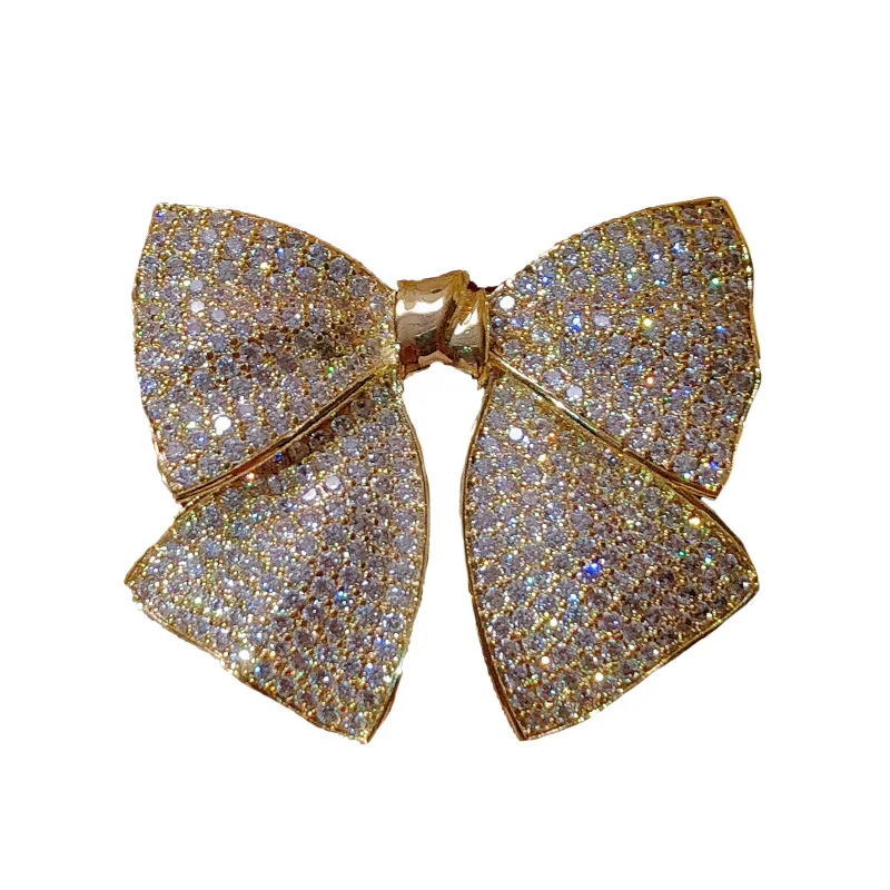 Korean version niche micro inlaid zircon full diamond bow brooch female temperament elegant versatile suit coat pin
Korean version niche micro inlaid zircon full diamond bow brooch female temperament elegant versatile suit coat pin