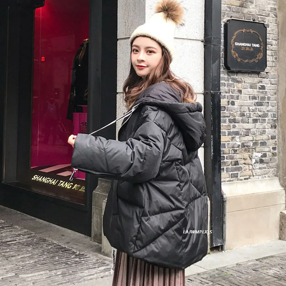 Winter Fashion Glossy Bright Down Parka 2021 Women's Hooded Coat Female Zip Jacket Oversize Loose Warm Thick Parka Women Jacket
Winter Fashion Glossy Bright Down Parka 2021 Women's Hooded Coat Female Zip Jacket Oversize Loose Warm Thick Parka Women Jacket