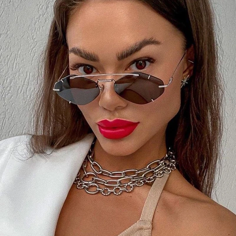 New Fashion Modern Small Rimless Sunglasses Women Brand Vintage Metal Punk Sun Glasses Men Irregular Shades Oculos Feminino
New Fashion Modern Small Rimless Sunglasses Women Brand Vintage Metal Punk Sun Glasses Men Irregular Shades Oculos Feminino