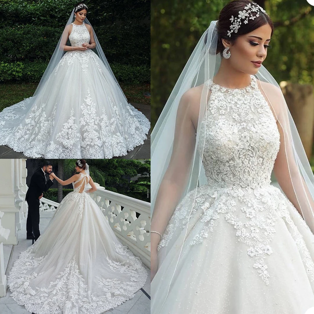 Luxurious Wedding Dresses Jewel Sleeveless Lace Appliques Bridal Gowns Custom Made Sweep Train Ball Gown Wedding Dress
Luxurious Wedding Dresses Jewel Sleeveless Lace Appliques Bridal Gowns Custom Made Sweep Train Ball Gown Wedding Dress