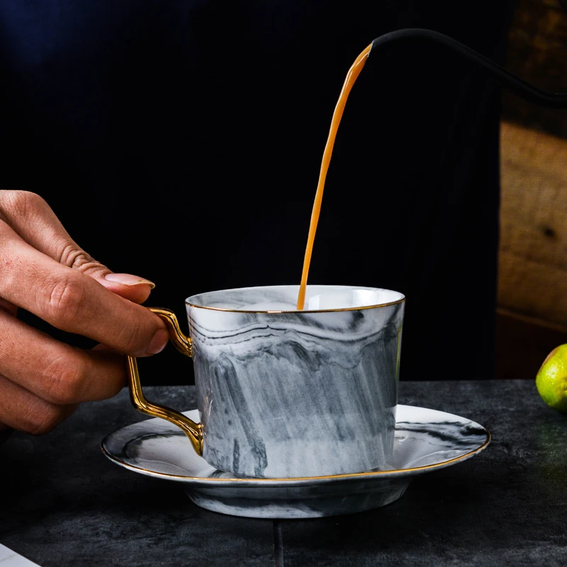 Simple and creative marbling ceramic coffee cup and dish set British afternoon tea black tea flower tea cup 
Simple and creative marbling ceramic coffee cup and dish set British afternoon tea black tea flower tea cup