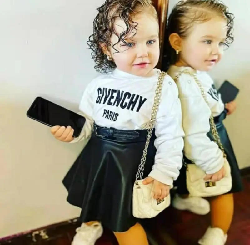 2Pcs Kids Girls Skirt Set, Letters Print O-Neck Long Sleeve T-Shirt + Leather Short Skirt Suit for Toddlers, 2-7Years
2Pcs Kids Girls Skirt Set, Letters Print O-Neck Long Sleeve T-Shirt + Leather Short Skirt Suit for Toddlers, 2-7Years