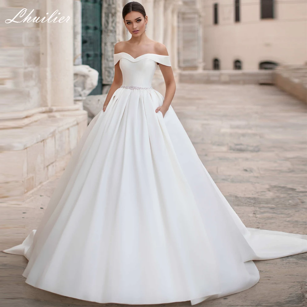 Lhuilier Elegant A-line Boat Neck Satin Wedding Dresses Off the Shoulder Chapel Train Beaded Bridal Dress with Pockets
Lhuilier Elegant A-line Boat Neck Satin Wedding Dresses Off the Shoulder Chapel Train Beaded Bridal Dress with Pockets