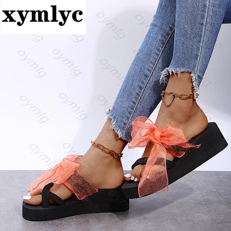Женские шлепанцы с бантом, сандалии больших размеров на танкетке, пляжные шлепанцы в римском стиле на плоской подошве, 2021 
Женские шлепанцы с бантом, сандалии больших размеров на танкетке, пляжные шлепанцы в римском стиле на плоской подошве, 2021