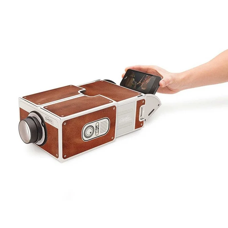 Mini Portable Cardboard Smart Phone Projector 2.0 Mobile Phone Projection for Home Theatre Audio & Video Projector ACEHE
Mini Portable Cardboard Smart Phone Projector 2.0 Mobile Phone Projection for Home Theatre Audio & Video Projector ACEHE