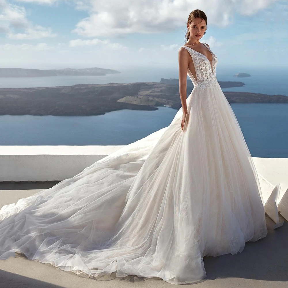 UZN New Arrival Ivory Princess Lace Tulle Beach Wedding Dress Sexy Deep V Neck Backless Bridal Gowns Illusion Top Brides Dresses 
UZN New Arrival Ivory Princess Lace Tulle Beach Wedding Dress Sexy Deep V Neck Backless Bridal Gowns Illusion Top Brides Dresses