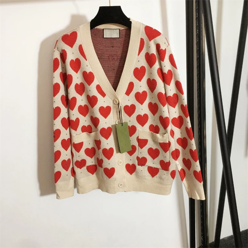 Hot sale ladies peach heart knit sweater street fashion casual O-neck V-neck Sweater
Hot sale ladies peach heart knit sweater street fashion casual O-neck V-neck Sweater