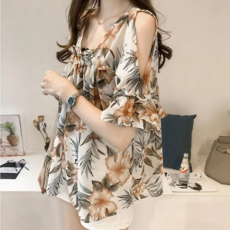 Large Size Chiffon Shirt Women Summer 2021 New Korean Fashion Shirt Loose Short-sleeved Off-shoulder Floral Blouse
Large Size Chiffon Shirt Women Summer 2021 New Korean Fashion Shirt Loose Short-sleeved Off-shoulder Floral Blouse