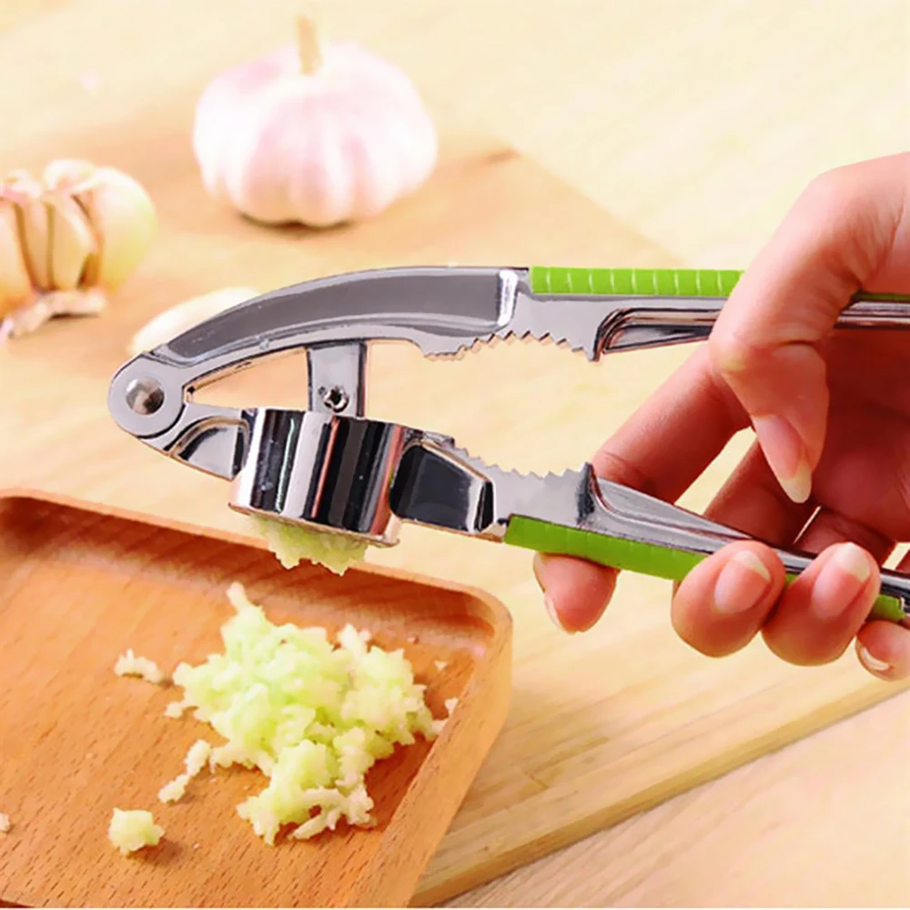 Stainless Steel Garlic Press Crusher Kitchen Cooking Ginger Squeezer Masher Handheld Ginger Mincer Tools Kitchen Accessories
Stainless Steel Garlic Press Crusher Kitchen Cooking Ginger Squeezer Masher Handheld Ginger Mincer Tools Kitchen Accessories