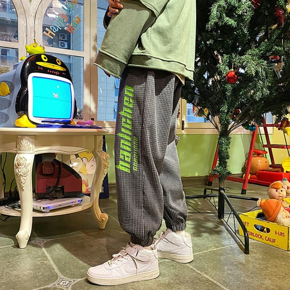Men Harem Pants Elastic Waist Corduroy Letter Print Track Pant Casua Vintage Jogger Pants Harajuku Fashion Trousers Men Clothing
Men Harem Pants Elastic Waist Corduroy Letter Print Track Pant Casua Vintage Jogger Pants Harajuku Fashion Trousers Men Clothing