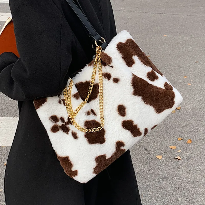 Cow Print Plush Shoulder Bags for Women Winter New Large Travel Handbag Big Soft Fake Fur Shopper Bag Female Warm Chain Tote Bag
Cow Print Plush Shoulder Bags for Women Winter New Large Travel Handbag Big Soft Fake Fur Shopper Bag Female Warm Chain Tote Bag