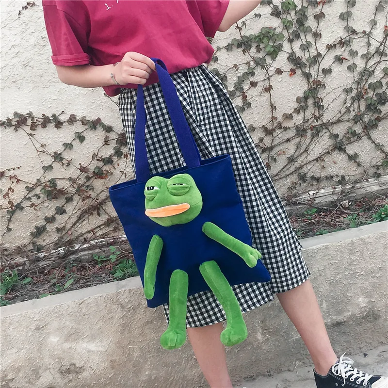 2022 Sad Frog Japanese And Korean Cartoon Art Personality Canvas Bag Cute Plush Doll Portable Messenger Bag Girls Handbag
2022 Sad Frog Japanese And Korean Cartoon Art Personality Canvas Bag Cute Plush Doll Portable Messenger Bag Girls Handbag