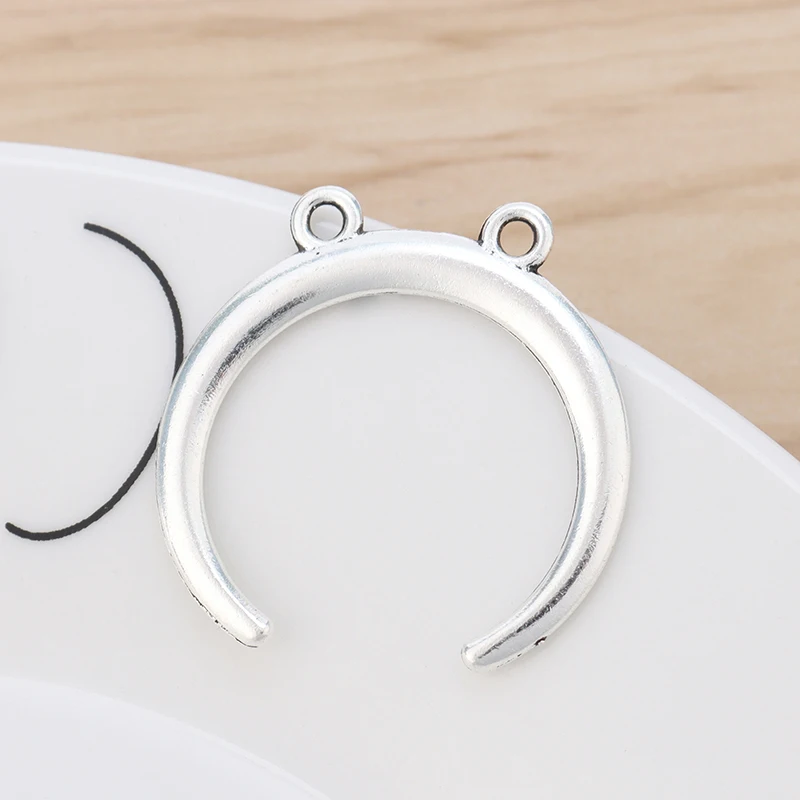 20 Pieces Tibetan Silver Double Horn Crescent Moon Charms Pendants for Necklace Jewelry Making Accessories 28x28mm
20 Pieces Tibetan Silver Double Horn Crescent Moon Charms Pendants for Necklace Jewelry Making Accessories 28x28mm