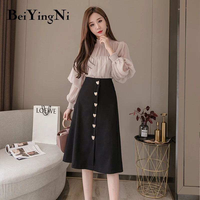 Beiyingni Work Wear Skirts Womens 2021 Autumn Winter High Waist Buttons Solid Color Elegant Midi Skirts Woman French Faldas Lady
Beiyingni Work Wear Skirts Womens 2021 Autumn Winter High Waist Buttons Solid Color Elegant Midi Skirts Woman French Faldas Lady
