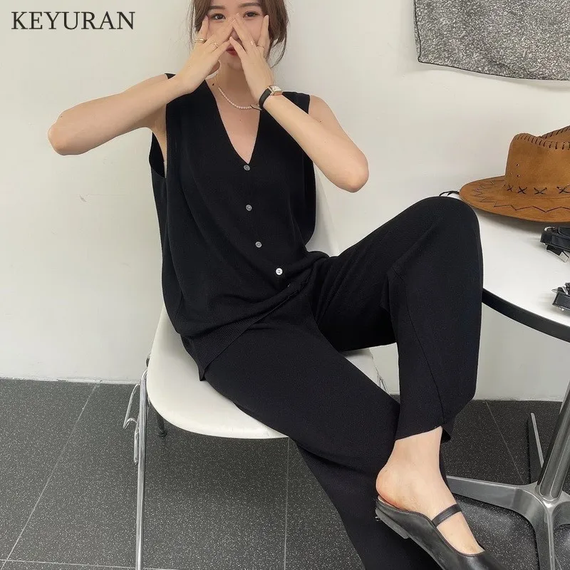 Women Knitted 2 Piece Set Summer Single Breasted Sleeveless Vest Sweater Top + Wide Leg Pant Suits Casual Loose Knitting Outfits
Women Knitted 2 Piece Set Summer Single Breasted Sleeveless Vest Sweater Top + Wide Leg Pant Suits Casual Loose Knitting Outfits